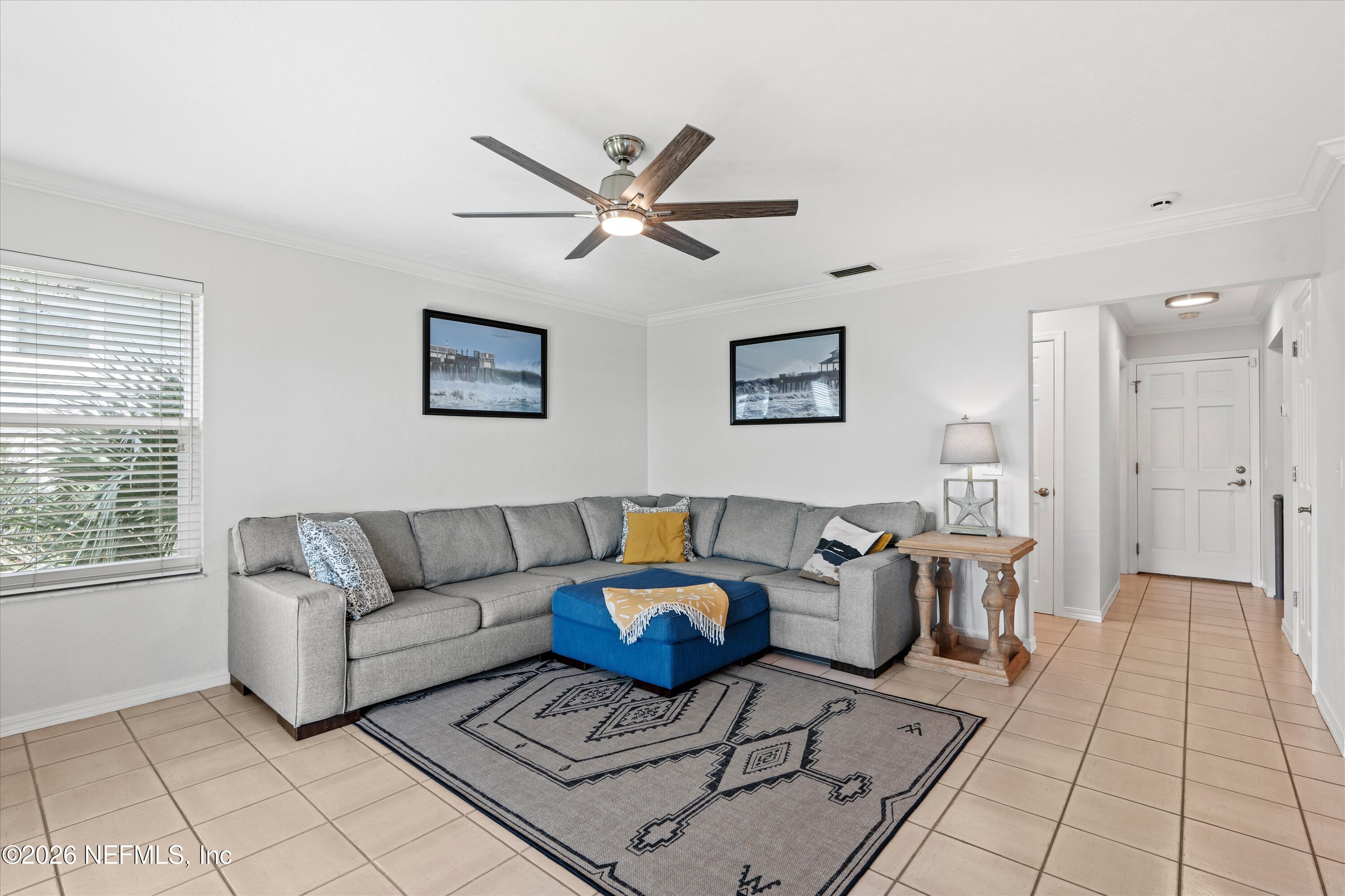 5532 Sunset Landing Circle St. Augustine, FL 32080 - Photo 27 of 43 a living room with furniture and a rug