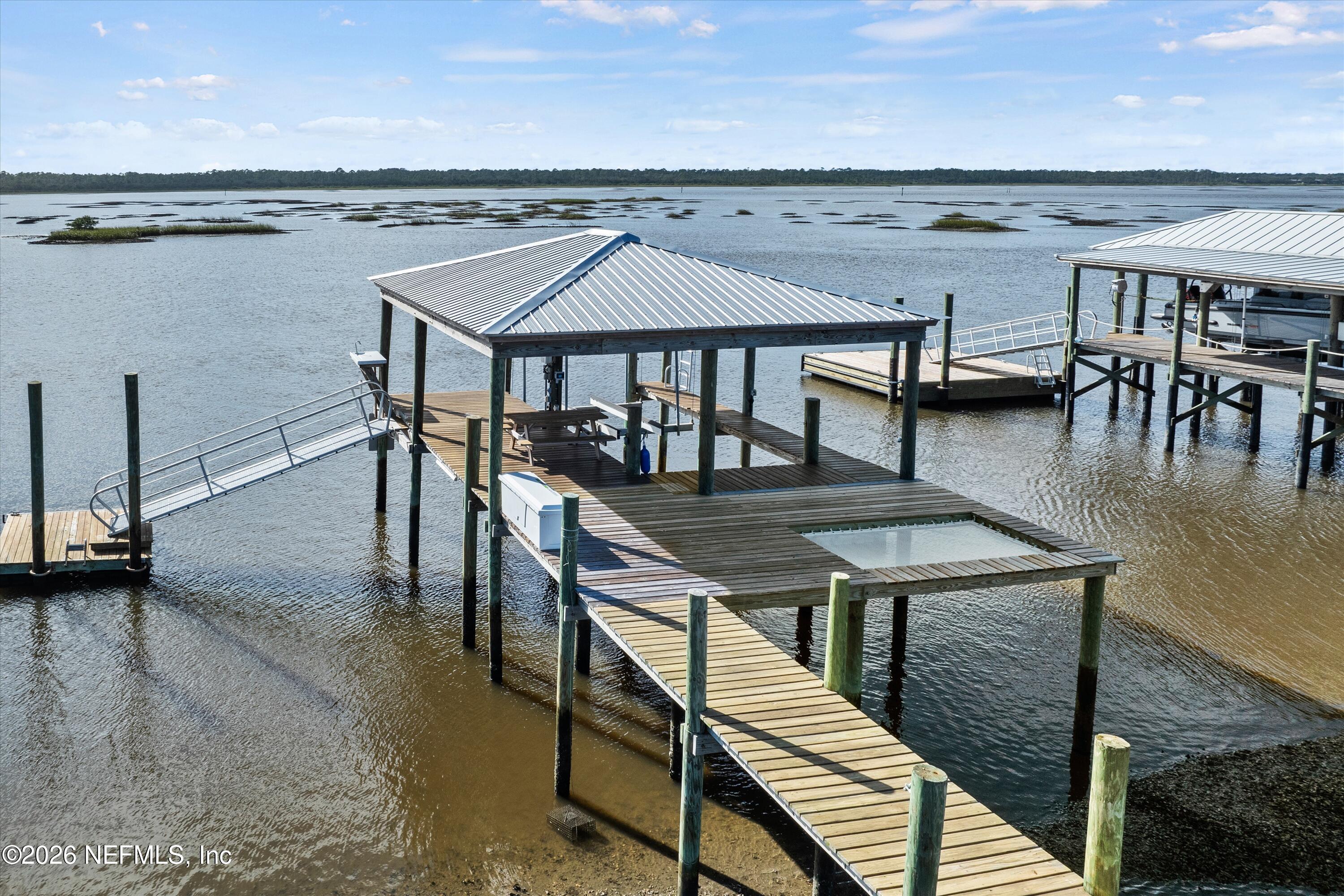 5532 Sunset Landing Circle St. Augustine, FL 32080 - Photo 36 of 43 a terrace with outdoor seating and city view