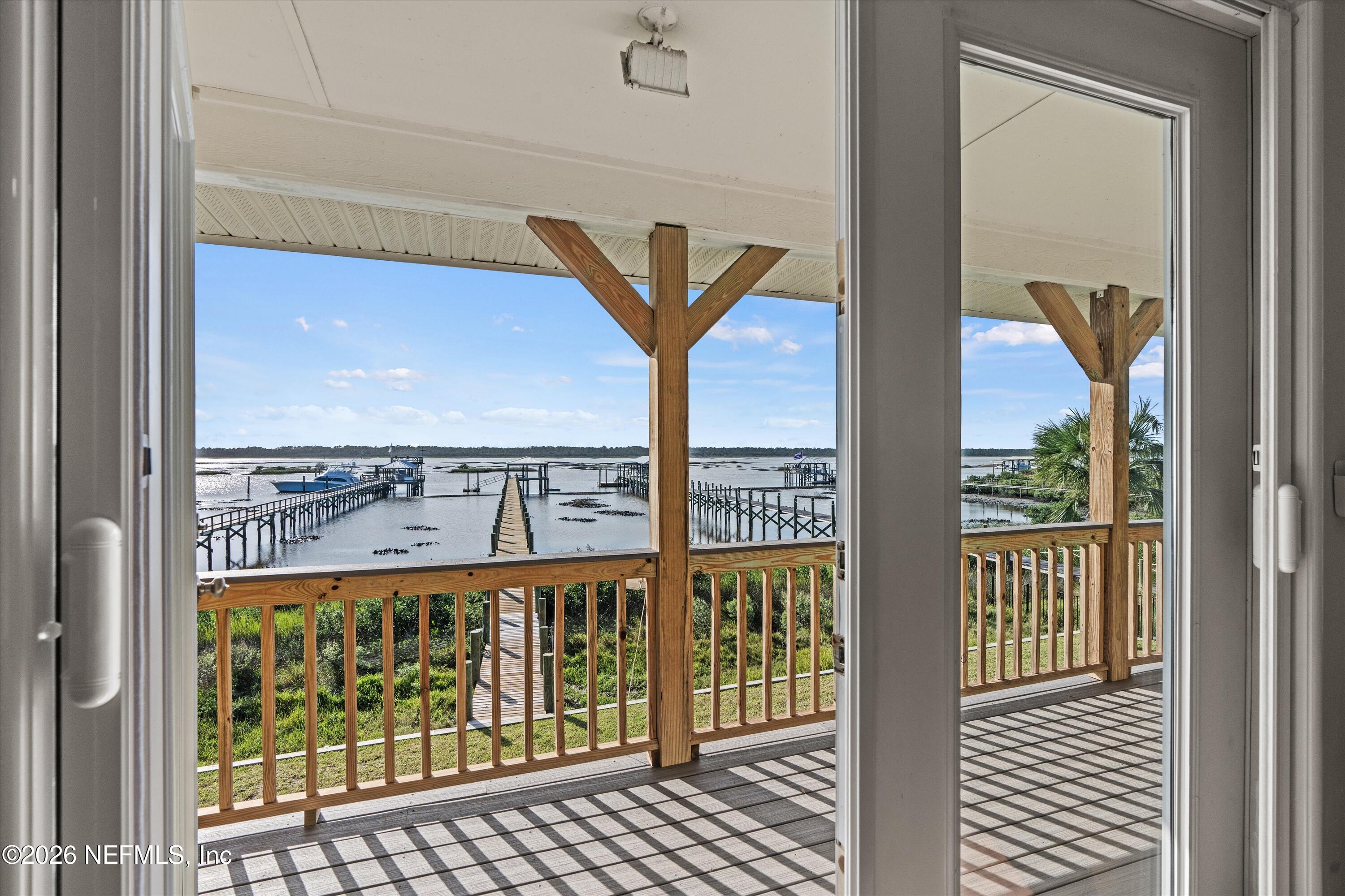 5532 Sunset Landing Circle St. Augustine, FL 32080 - Photo 37 of 43 22-Primary Bedroom Balcony