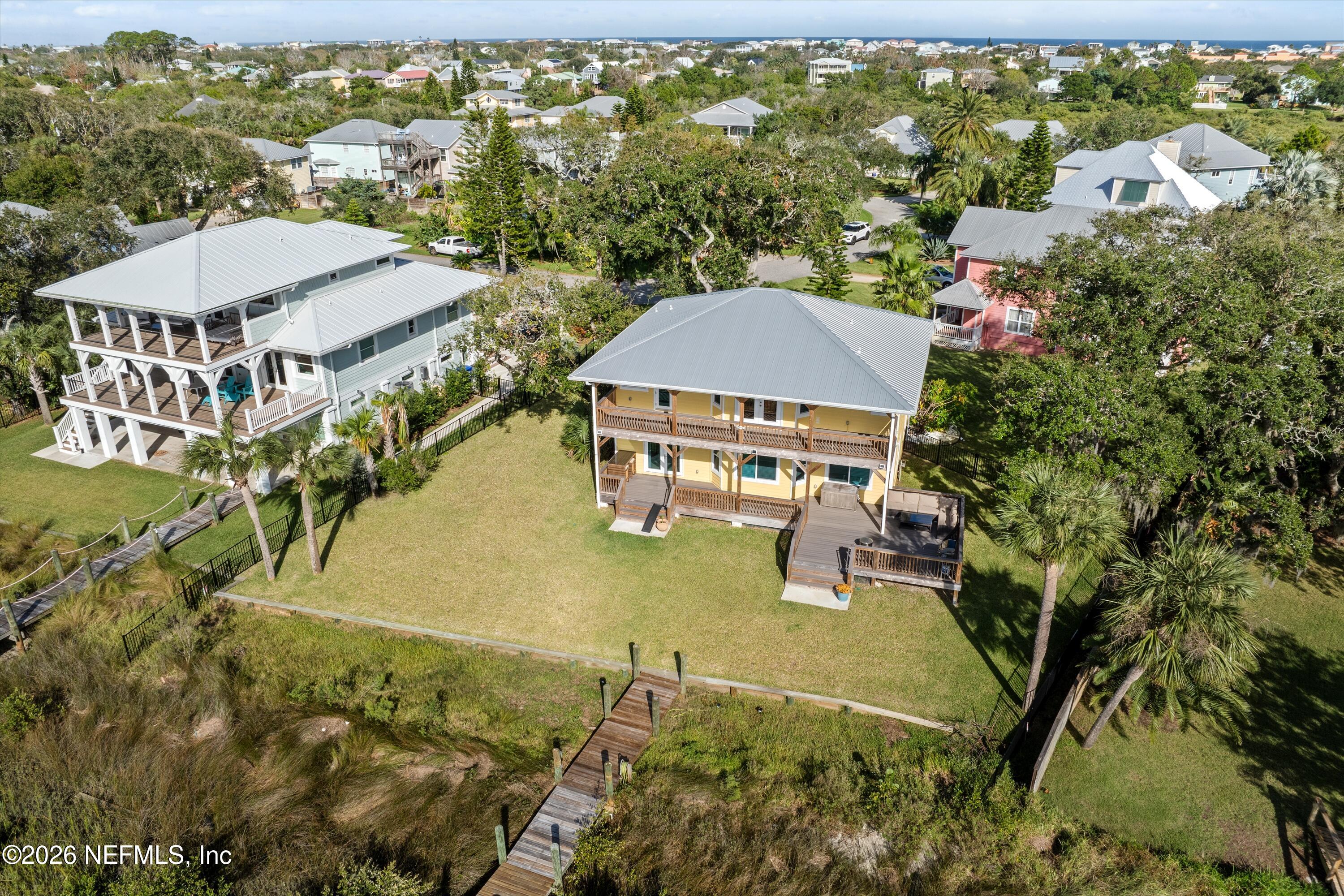 5532 Sunset Landing Circle St. Augustine, FL 32080 - Photo 43 of 43 an aerial view of residential houses with outdoor space and trees