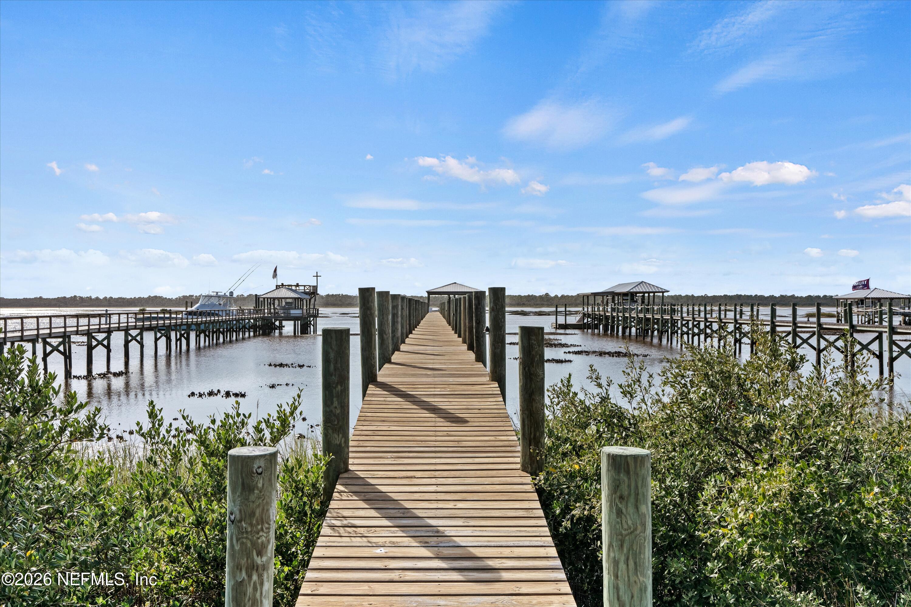 5532 Sunset Landing Circle St. Augustine, FL 32080 - Photo 6 of 43 a view of a balcony with wooden floor and city view