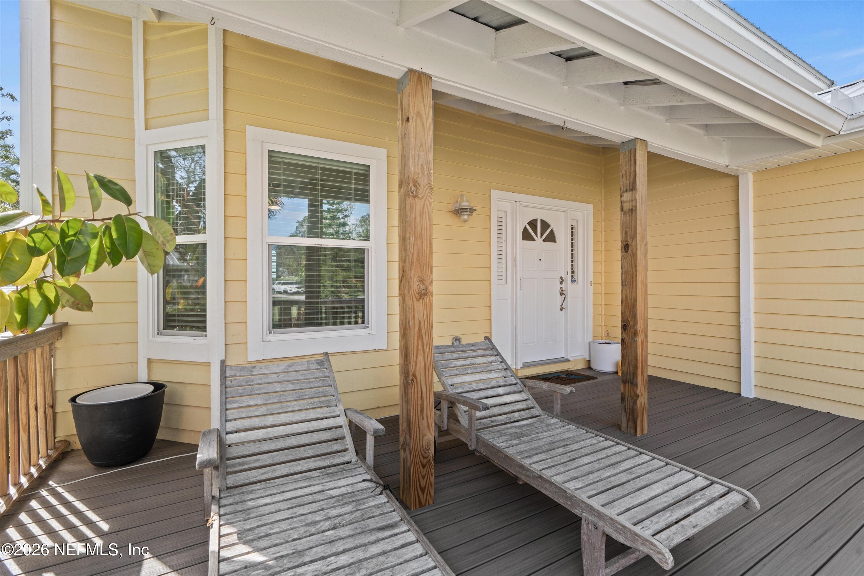 5532 Sunset Landing Circle St. Augustine, FL 32080 - Photo 9 of 43 a view of a deck with wooden floor and a potted plant