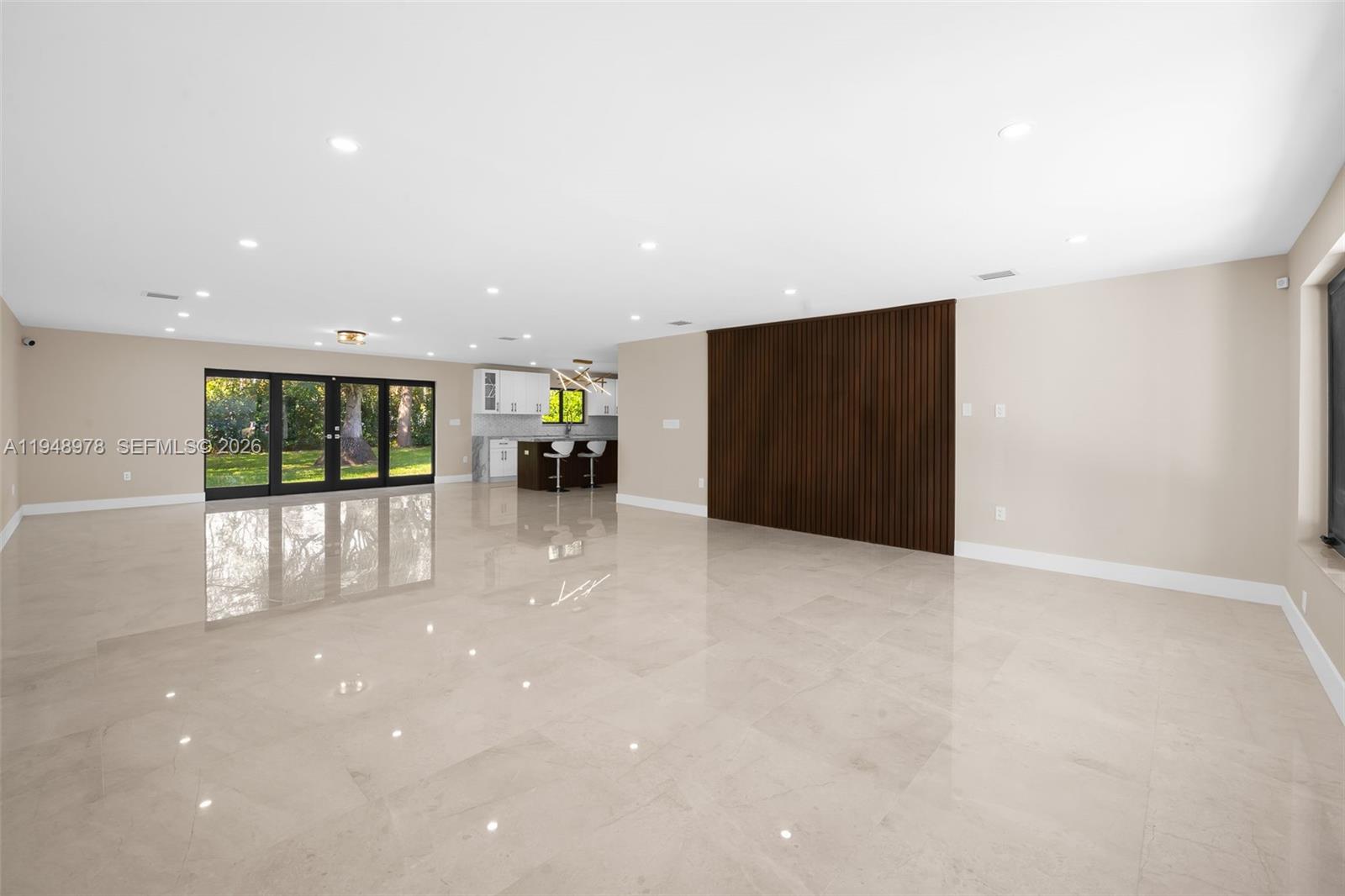 12820 Southwest 83rd Court Pinecrest, FL 33156 - Photo 2 of 38 a view of an empty room