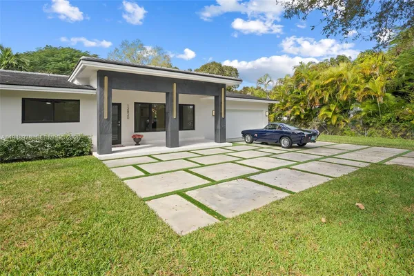 a view of a house with a patio