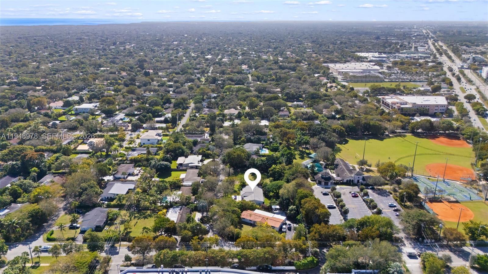 12820 Southwest 83rd Court Pinecrest, FL 33156 - Photo 32 of 38 an aerial view of multiple house