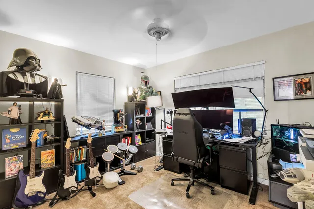 a view of a workspace with furniture