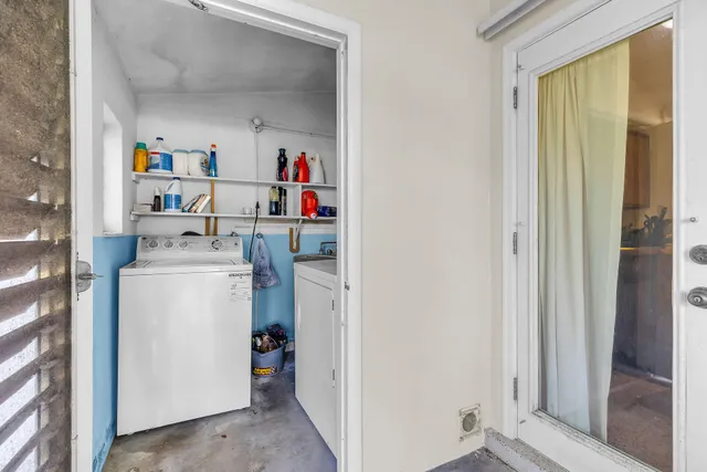 a room with storage and utility