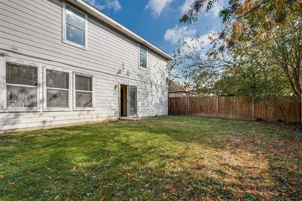 a house view with a garden space