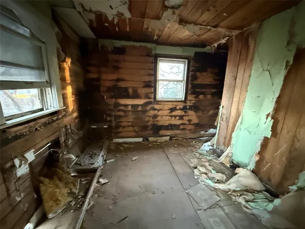 an empty room with windows