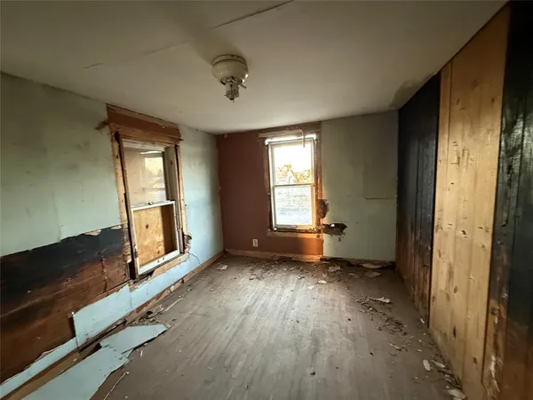 an empty room with windows