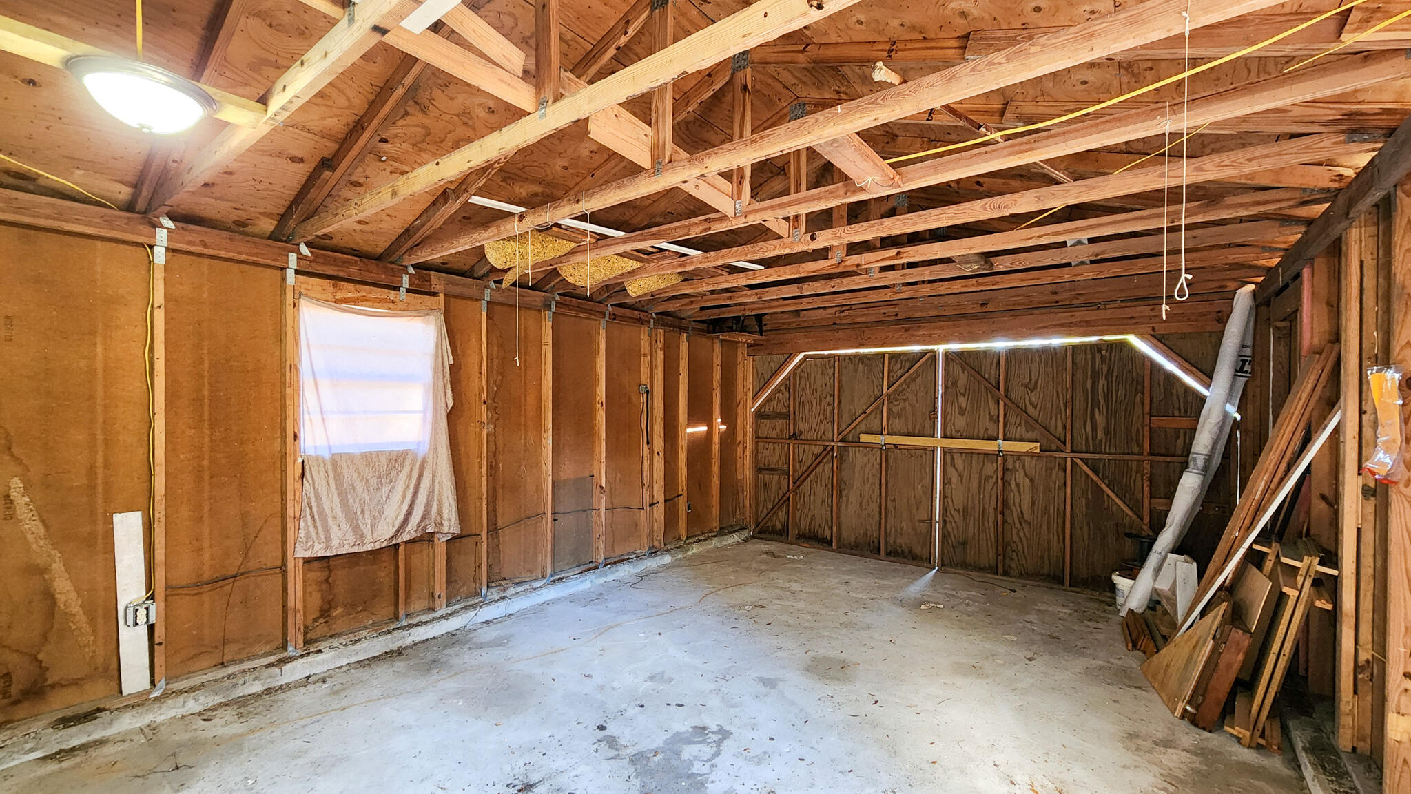 1200 Forest Heights Road Fort Walton Beach, FL 32547 - Photo 11 of 24 a view of an empty room with wooden walls