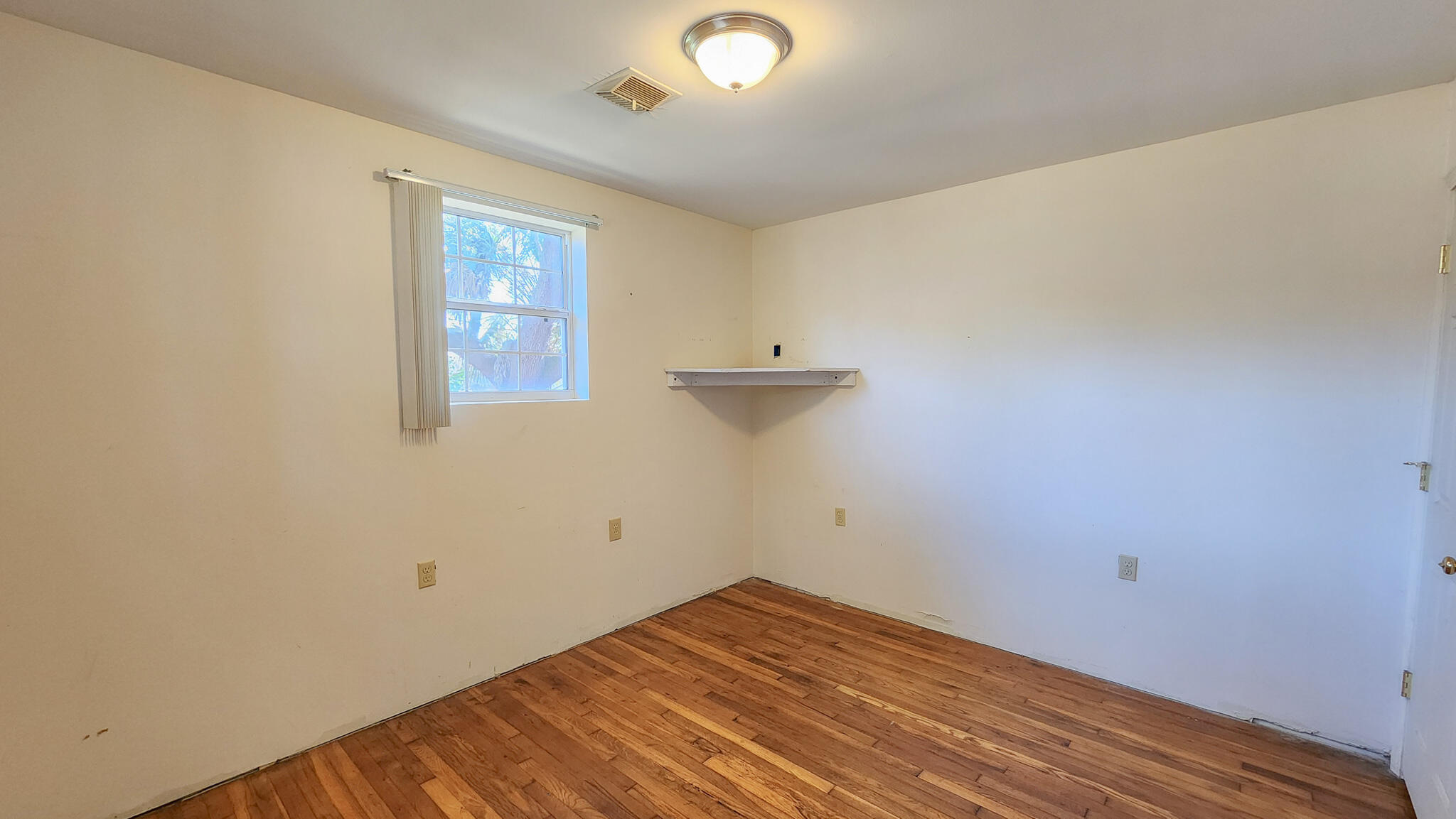 1200 Forest Heights Road Fort Walton Beach, FL 32547 - Photo 21 of 24 an empty room with a window