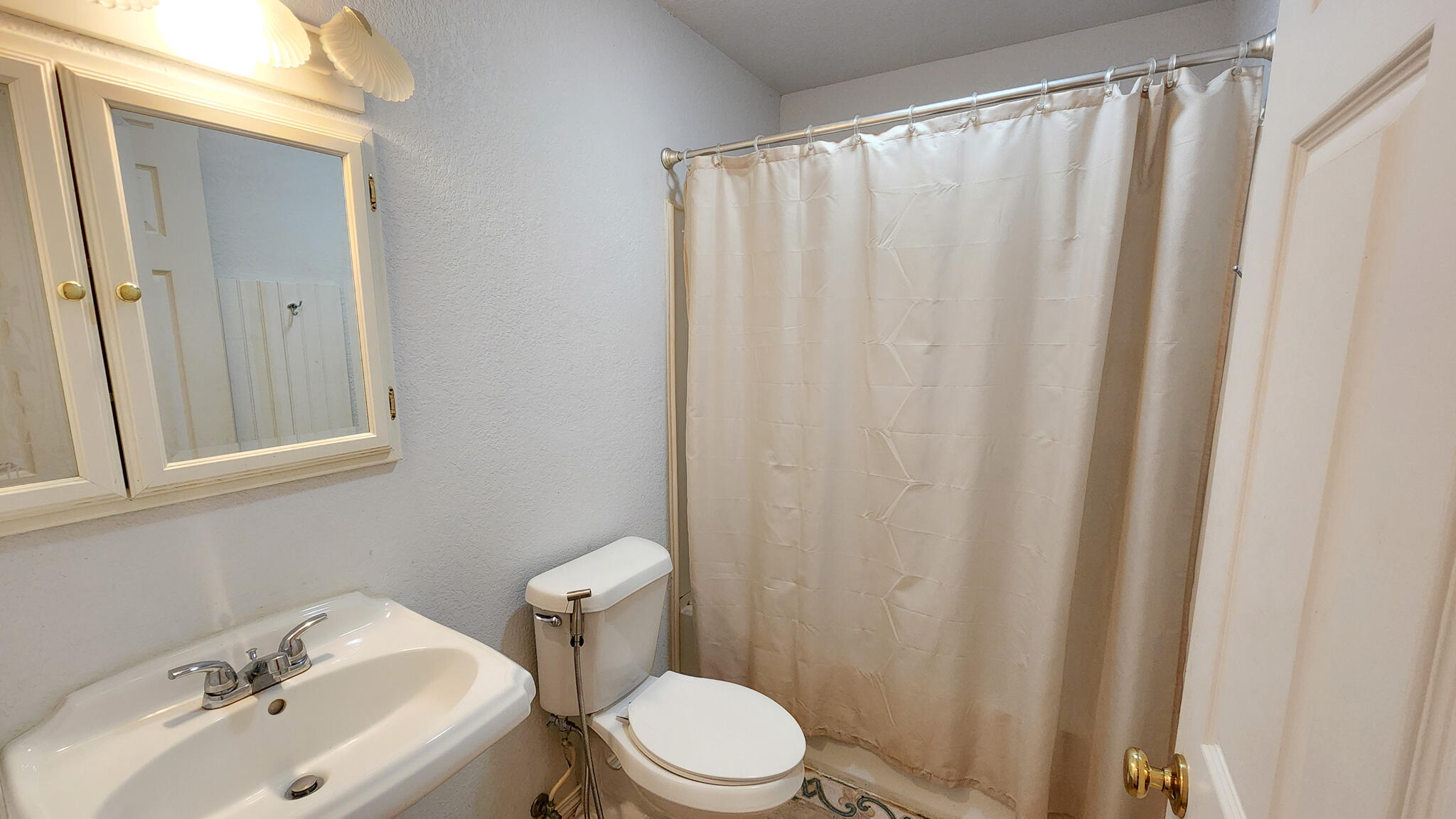 1200 Forest Heights Road Fort Walton Beach, FL 32547 - Photo 22 of 24 a bathroom with a sink and a toilet