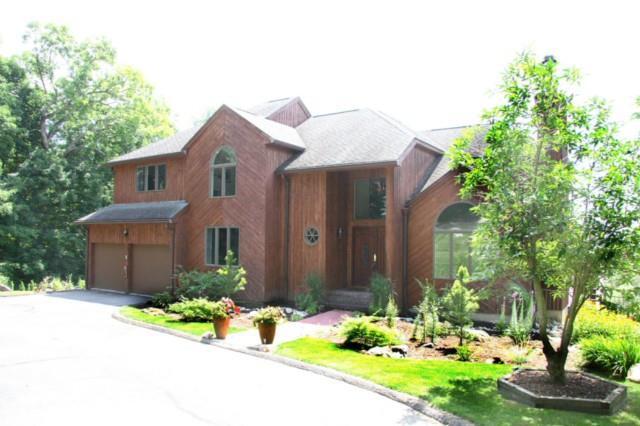 13 Sundance Road New Milford, CT 06776 - Photo 1 of 1 a front view of a house with a yard