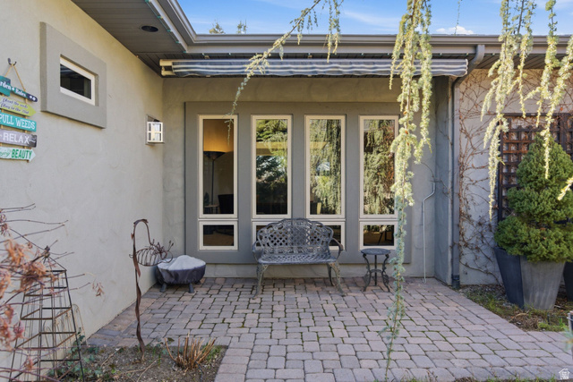 145 Carnesecca Court Mapleton, UT 84664 - Photo 59 of 109 View of atrium featuring a patio and stucco siding