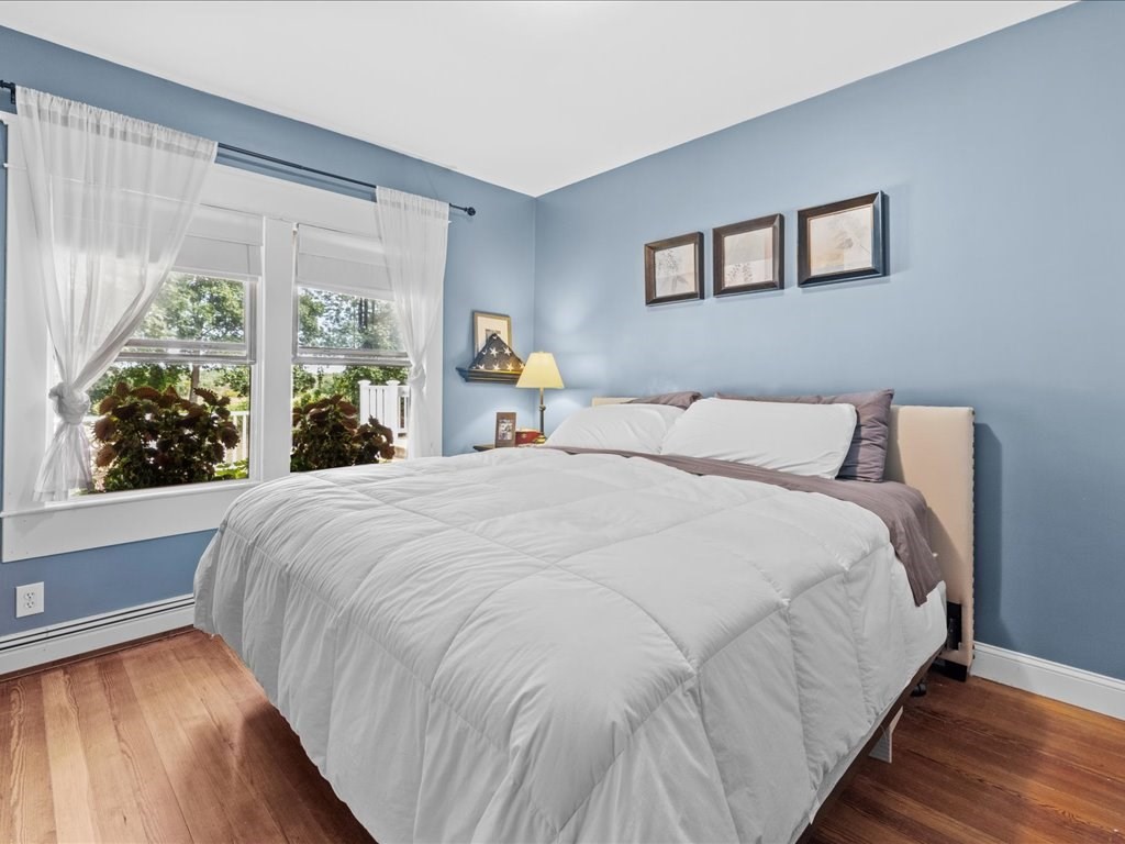 37 Summer Street Dighton, MA 02764 - Photo 16 of 34 a large bed sitting in a bedroom next to a window