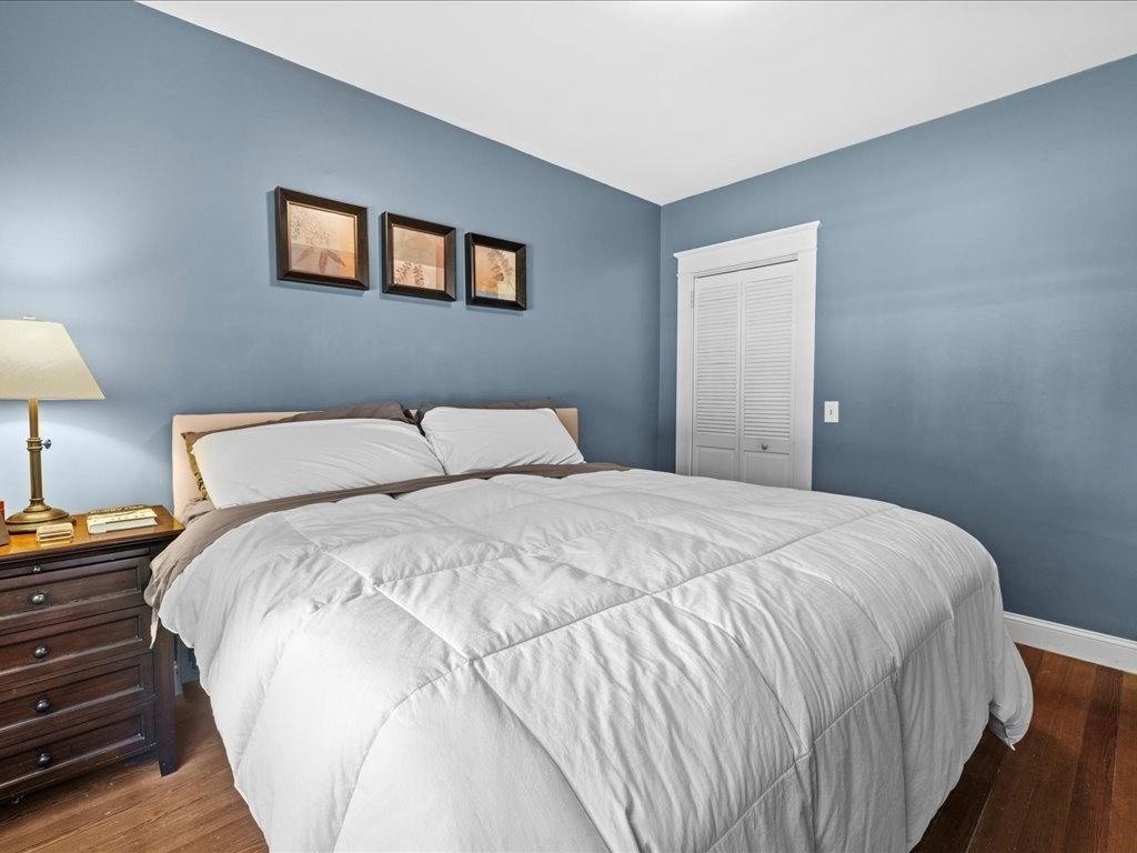 37 Summer Street Dighton, MA 02764 - Photo 17 of 34 a bedroom with a bed and a lamp