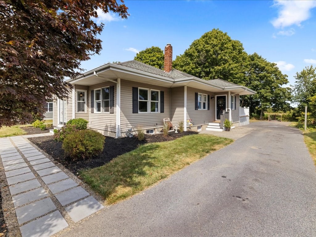 37 Summer Street Dighton, MA 02764 - Photo 27 of 34 a front view of a house with garden