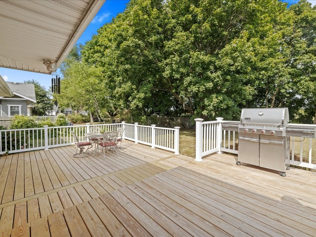 37 Summer Street Dighton, MA 02764 - Photo 30 of 34 a view of a wooden deck and a patio with swimming pool