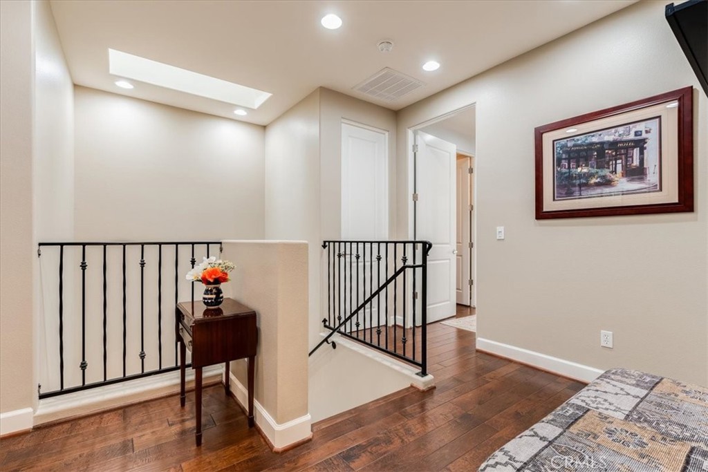 1197 Swallowtail Way, Unit 61 Nipomo, CA 93444 - Photo 23 of 36 Stairs to 2nd Floor and Hallway between Primary Bedroom and 2nd & 3rd Bedrooms