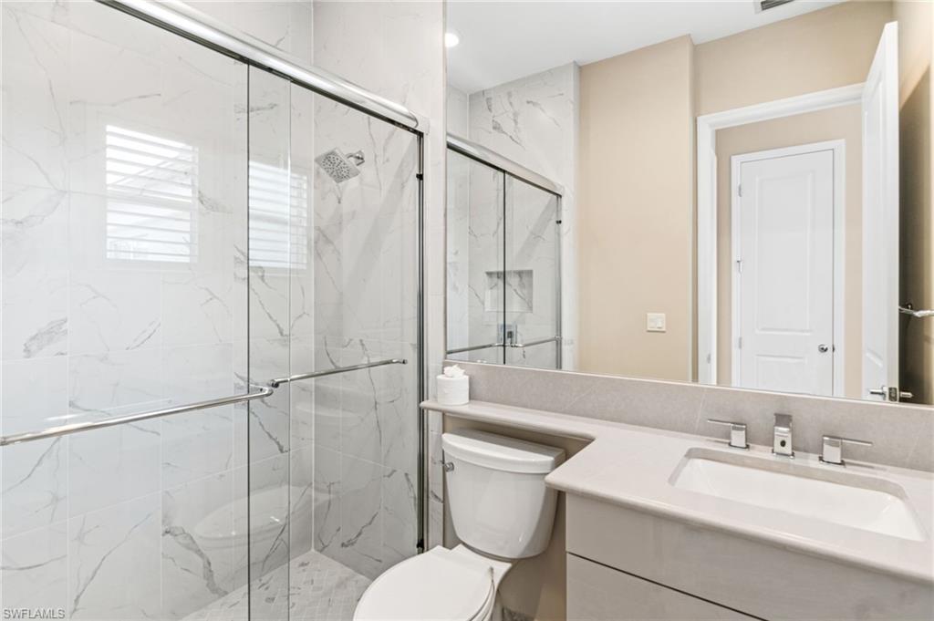12033 Azalea Way Naples, FL 34120 - Photo 22 of 46 3rd bathroom