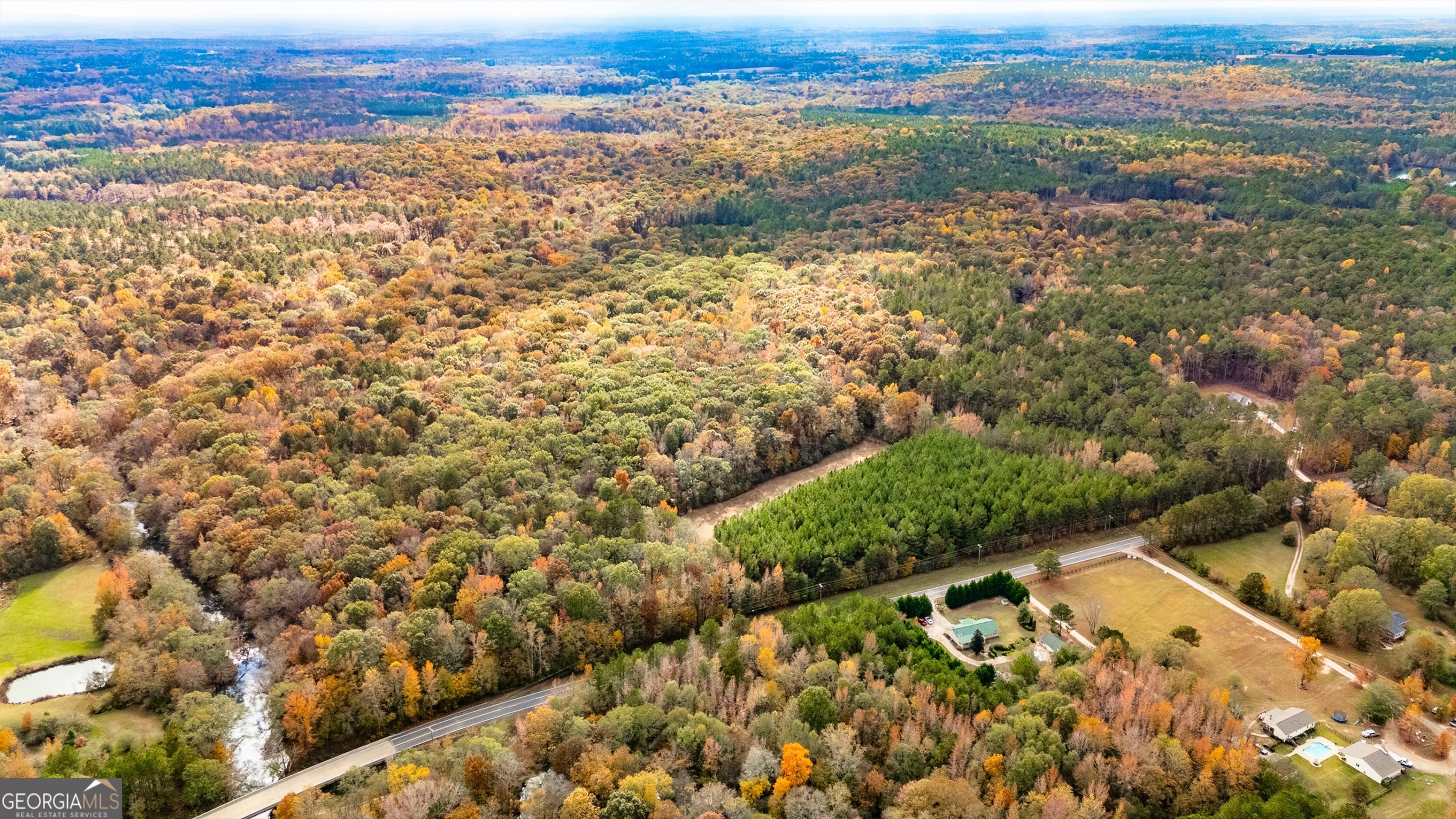0 Morgan Mill Road Senoia, GA 30276 - Photo 4 of 31 an aerial view of residential houses with outdoor space
