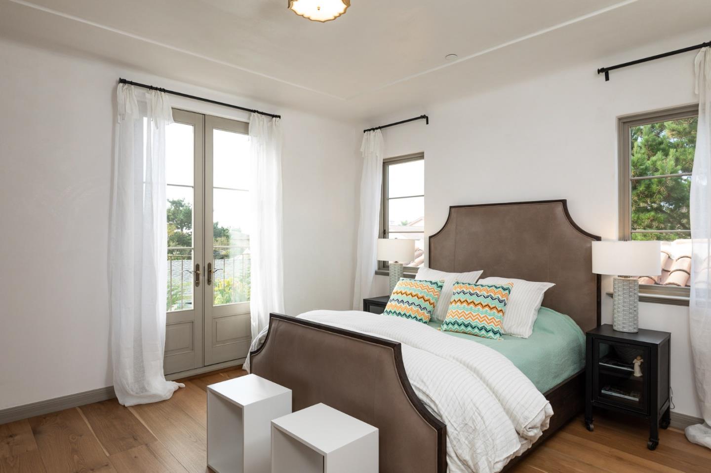 3028 Valdez Road Pebble Beach, CA 93953 - Photo 16 of 27 a bedroom with a bed and a window