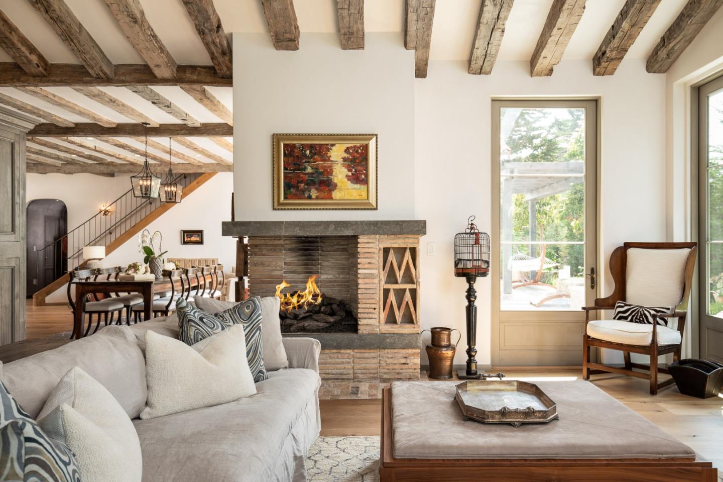 3028 Valdez Road Pebble Beach, CA 93953 - Photo 7 of 27 a living room with furniture or couch and a fireplace