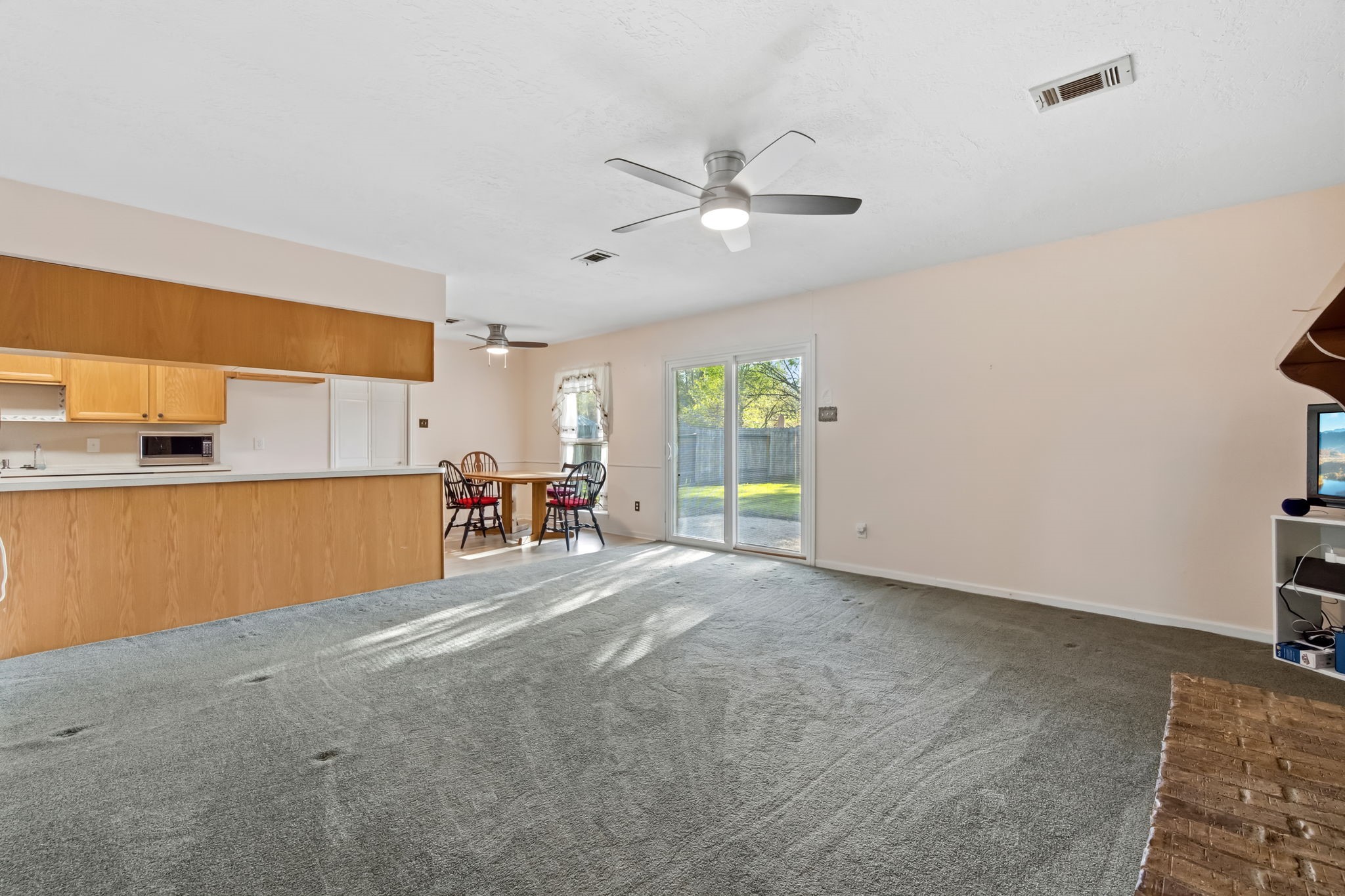 1609 Bowie Street Liberty, TX 77575 - Photo 12 of 24 a room with window and a ceiling fan