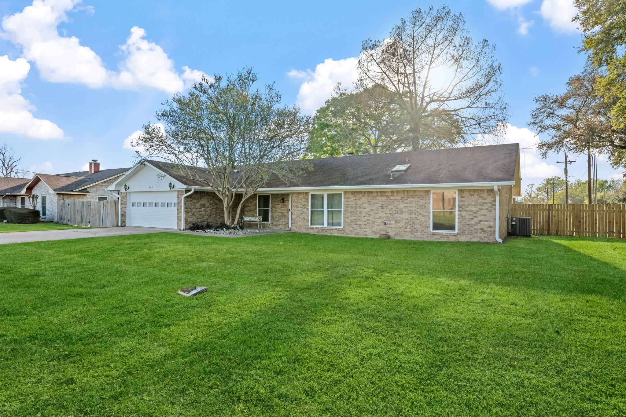 1609 Bowie Street Liberty, TX 77575 - Photo 2 of 24 a house view with a garden space