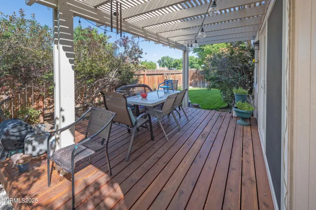 a view of a chairs on the roof deck