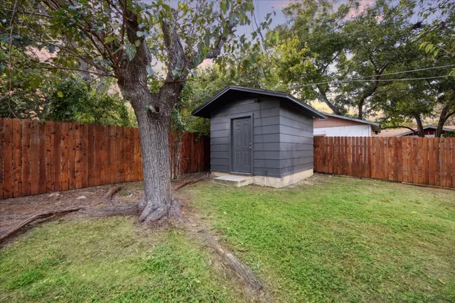a view of a kitchen with furniture and window