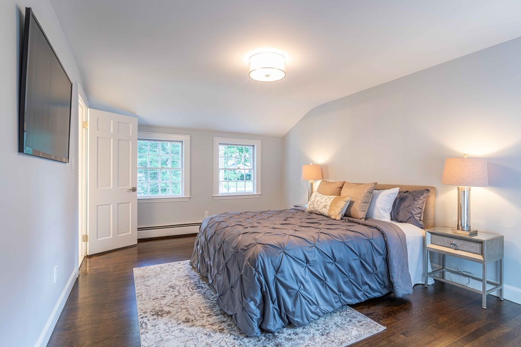49 Pilgrim Road Wellesley, MA 02481 - Photo 15 of 25 a bedroom with a bed and a window