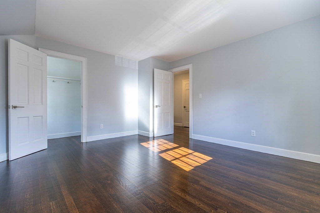 49 Pilgrim Road Wellesley, MA 02481 - Photo 18 of 25 an empty room with wooden floor