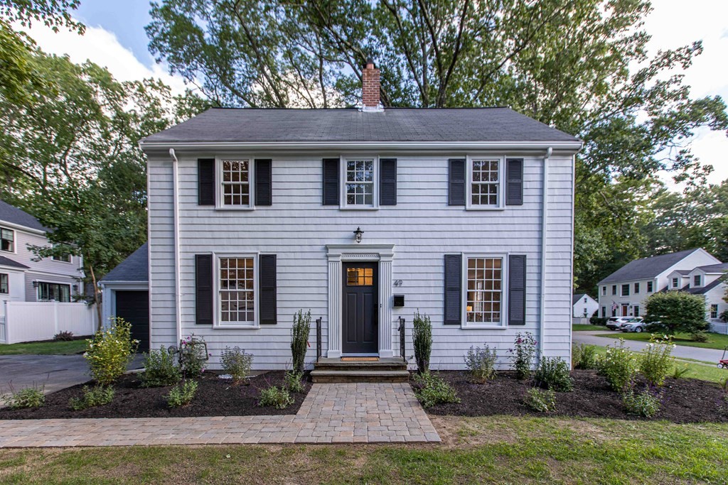 49 Pilgrim Road Wellesley, MA 02481 - Photo 2 of 25 a house that has a tree in front of the house