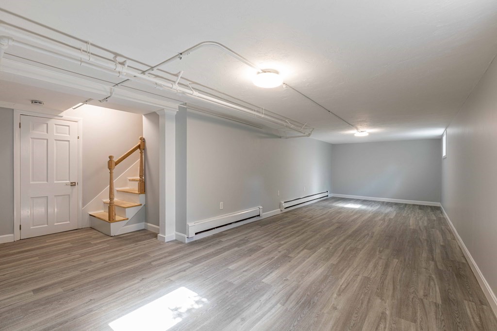 49 Pilgrim Road Wellesley, MA 02481 - Photo 23 of 25 a view of empty room with wooden floor