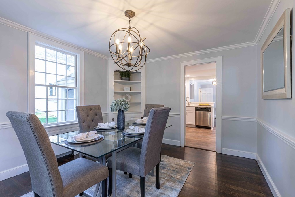 49 Pilgrim Road Wellesley, MA 02481 - Photo 7 of 25 a view of a dining room with furniture wooden floor and chandelier