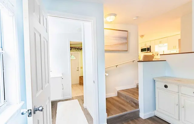 a view of a bathroom from a hallway