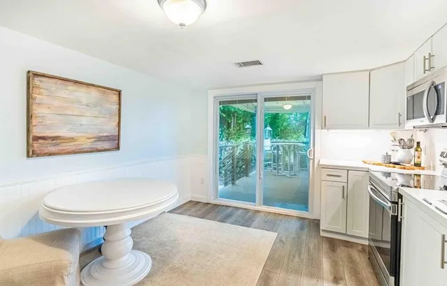 a room with furniture and a large window