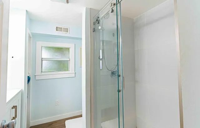 a bathroom with a mirror