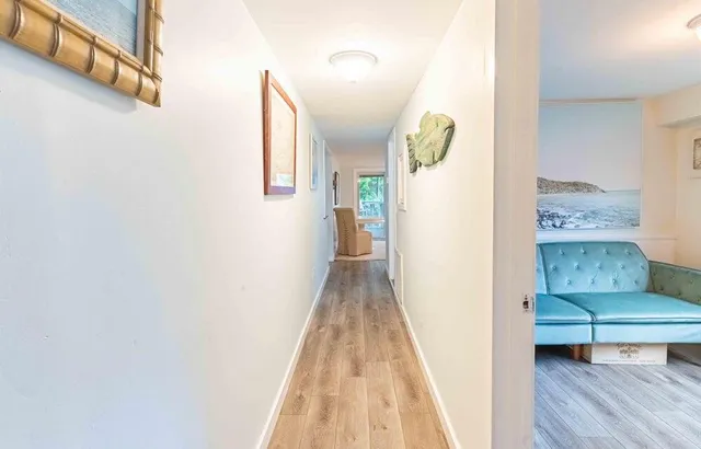 a view of livingroom with furniture and wooden floor