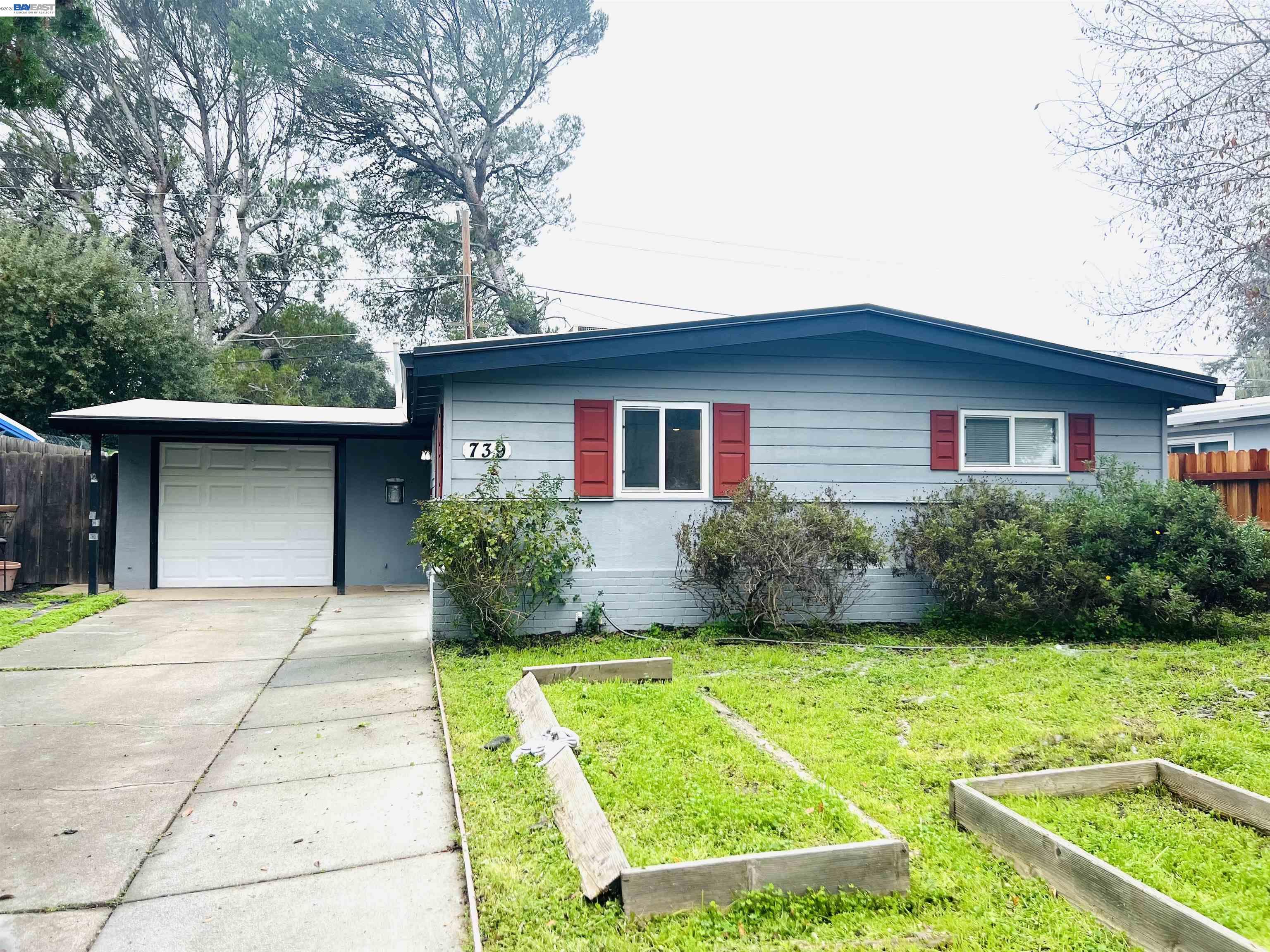 739 M Street Davis, CA 95616 - Photo 2 of 14 a house view with a garden space