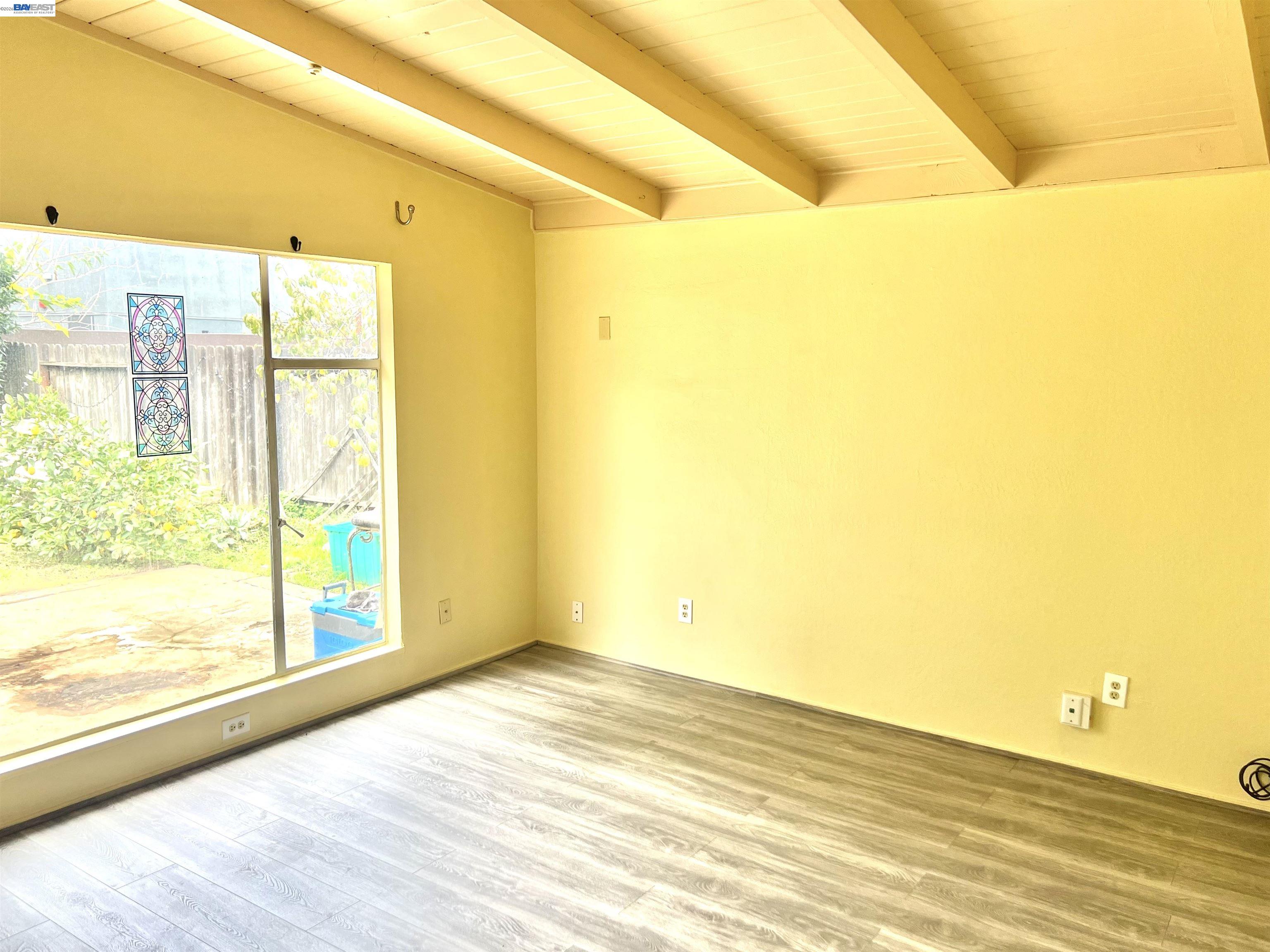 739 M Street Davis, CA 95616 - Photo 3 of 14 a view of an empty room and window