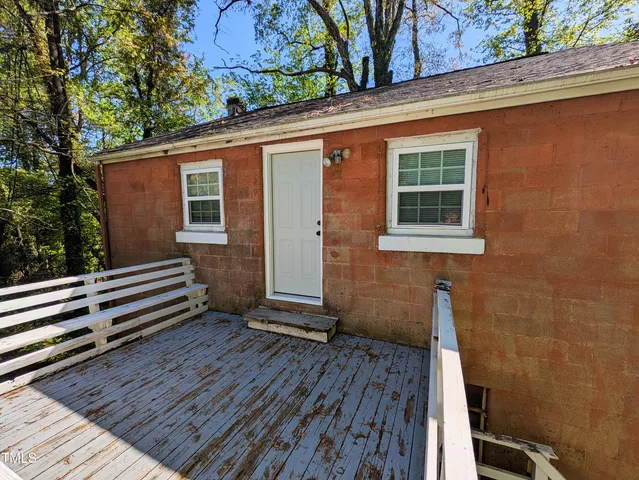 a view of a house with a deck
