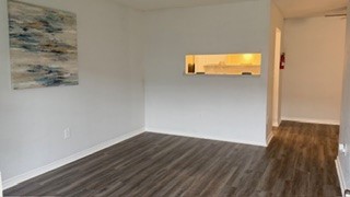 2101 Mustang Road Alvin, TX 77511 - Photo 1 of 9 a view of a room with wooden floor and a window