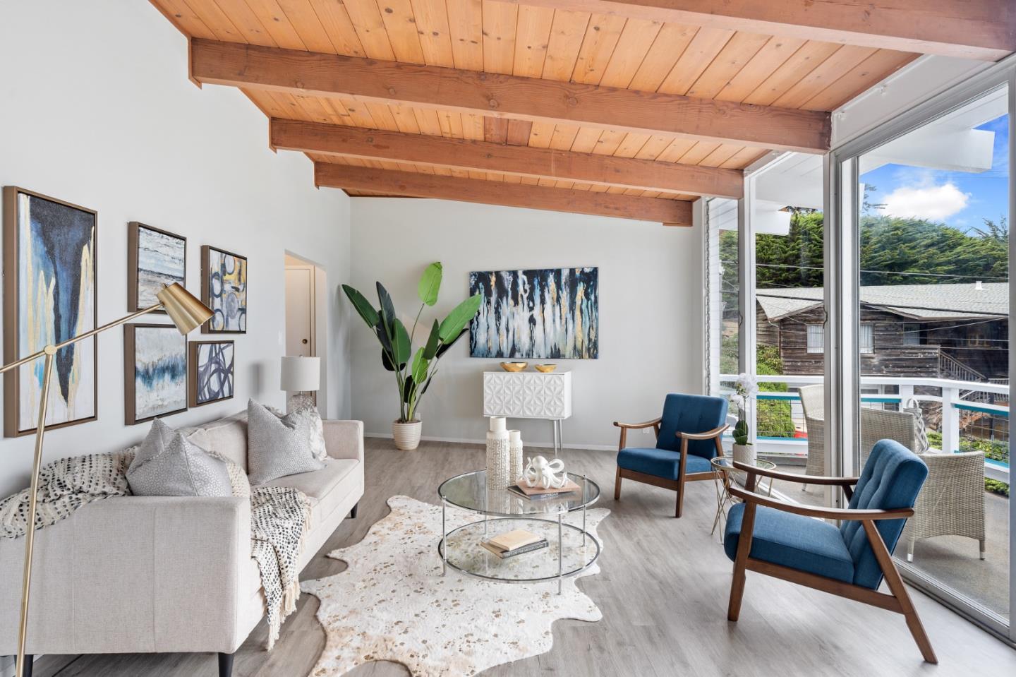 144 Kent Road Pacifica, CA 94044 - Photo 12 of 44 a living room with furniture and a large window