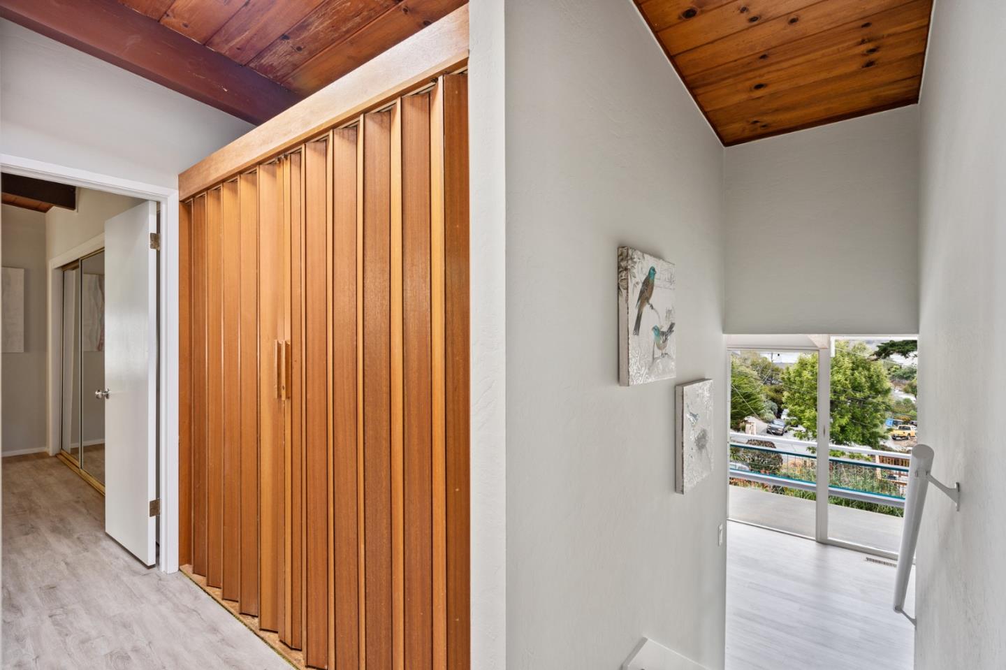 144 Kent Road Pacifica, CA 94044 - Photo 26 of 44 a view of walk in closet with wooden floor