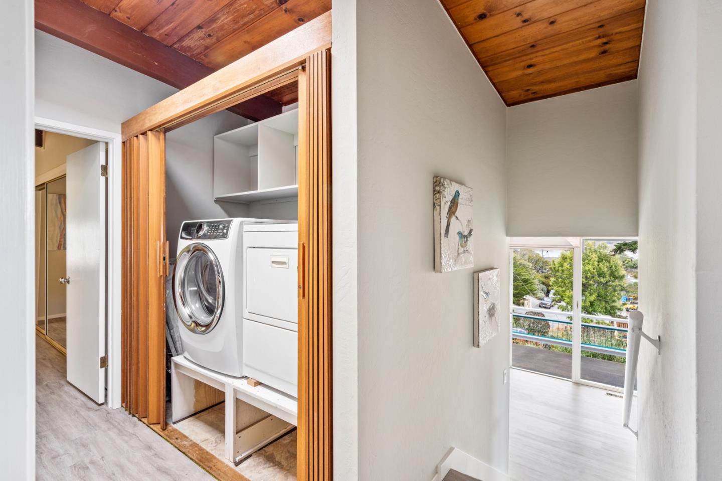 144 Kent Road Pacifica, CA 94044 - Photo 35 of 44 a view of walk in closet with clothes and shoes