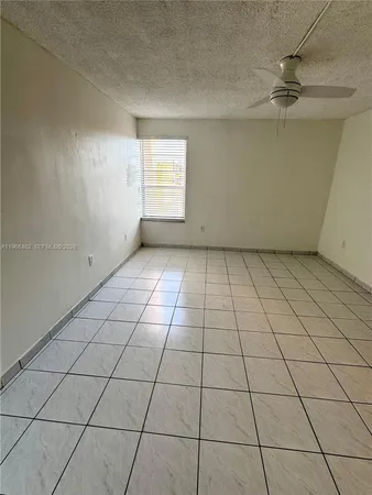 a bathroom with a shower and a toilet