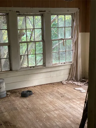 a stove top oven sitting inside of a kitchen